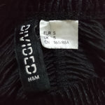 Black Davide crop top fabric and label detail