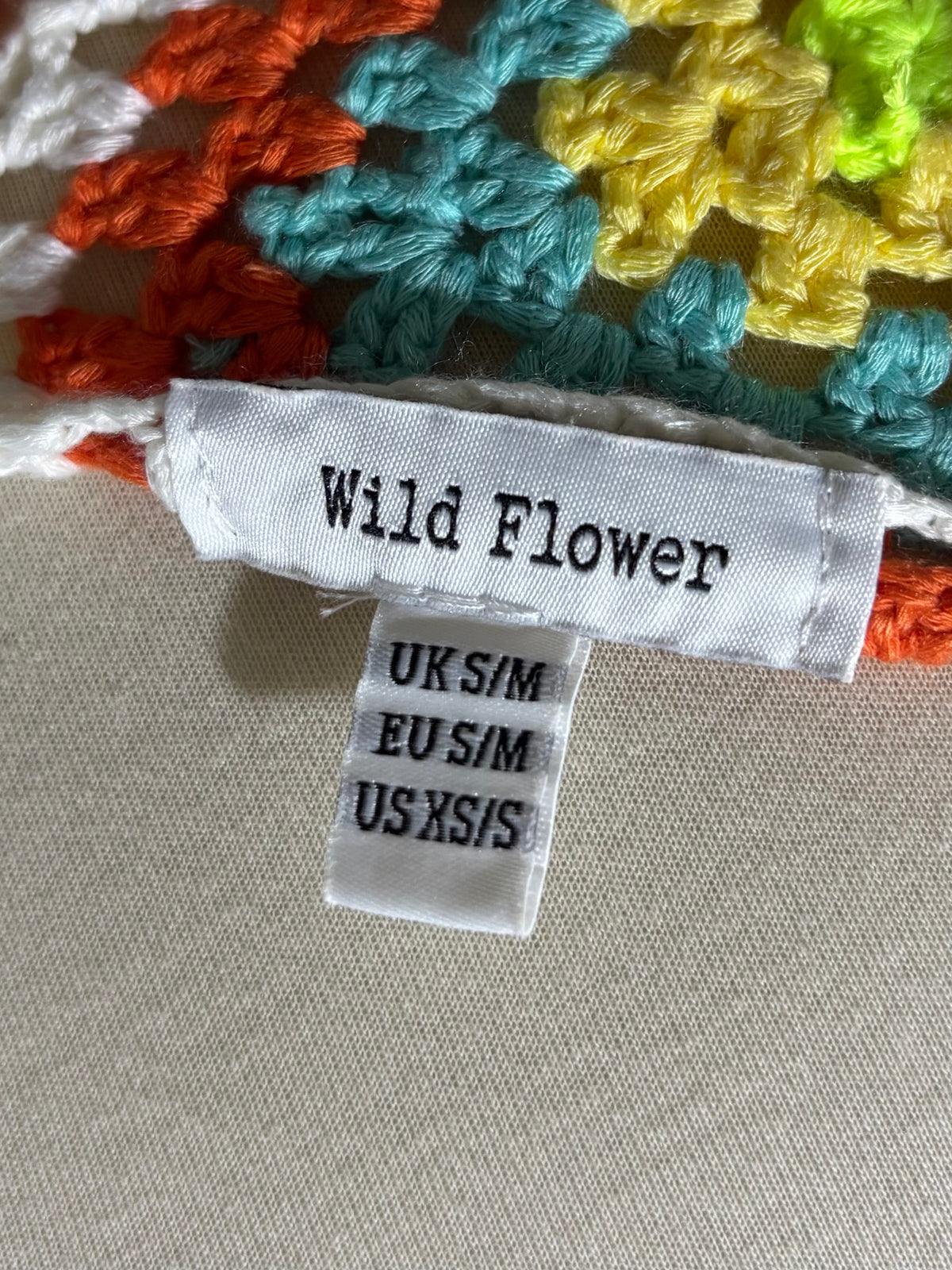 Wild Flower label showing UK S/M EU S/M US XS/S
