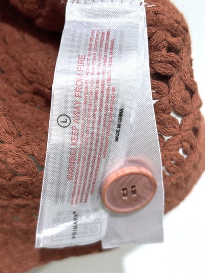 Primark garment label showing size L - alternate view