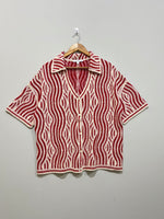 Red and cream wavy-stripe collared button-front shirt with dropped shoulders and short sleeves