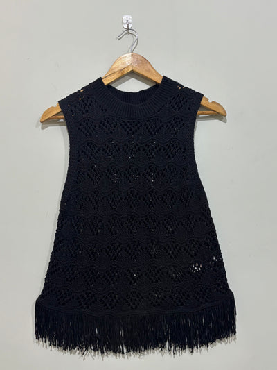 Black sleeveless openwork round-neck top with fringed hem