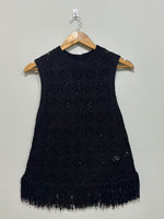 Black sleeveless openwork round-neck top with fringed hem