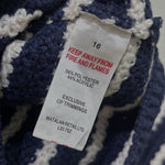 Cardigan label showing size 16 and fabric composition of 56% polyester and 44% acrylic.