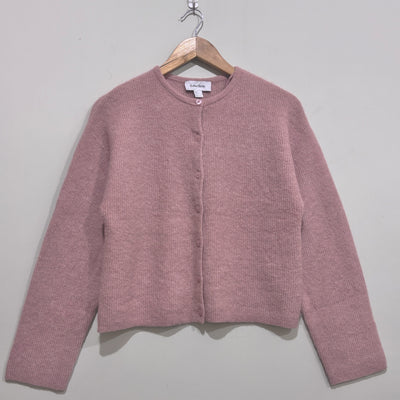 Dusty pink round-neck button-front cardigan with dropped shoulders, long sleeves and a straight hem.