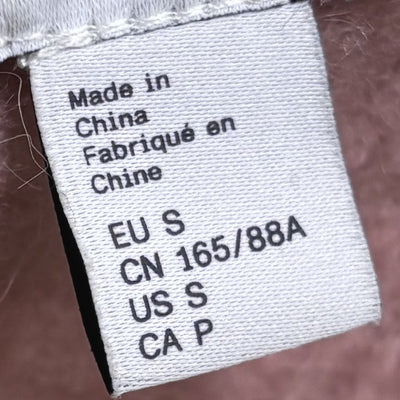 Cardigan size label showing EU S, US S, CN 165/88A and CA P. - alternate view
