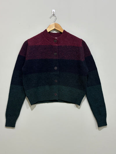 Cropped button-front cardigan with wide burgundy, navy and dark green horizontal color blocks, long sleeves and ribbed trims.