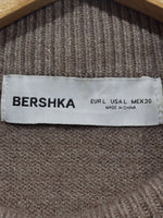 Bershka label showing EUR L, USA L and MEX 30.
