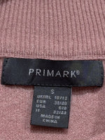 Primark label showing size S, UK/IRL 10/12 and EUR 38/40.