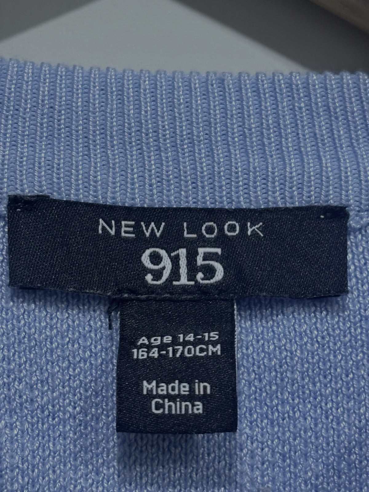 New Look 915 label showing Age 14–15 and height 164–170 cm.