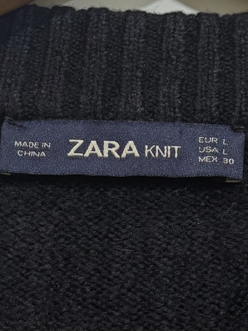 ZARA KNIT label showing EUR L, USA L and MEX 30.