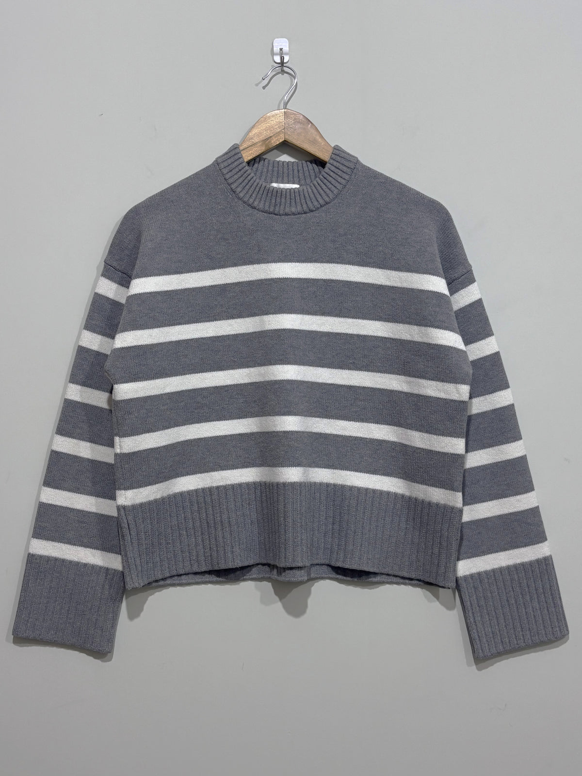 Grey and white horizontally striped crew-neck blouse with dropped shoulders, long sleeves and deep ribbed cuffs and hem.