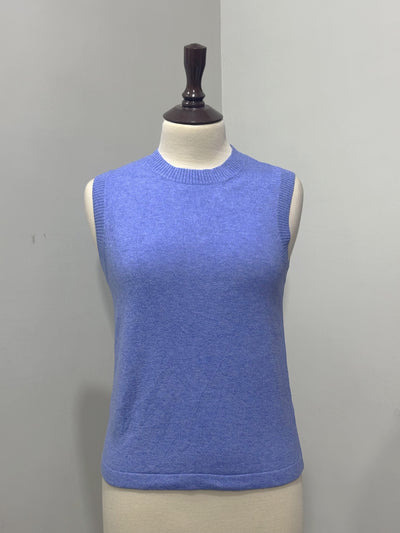 Periwinkle blue sleeveless crew-neck sweater vest displayed on a mannequin