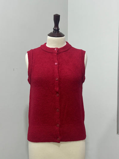 Red button-front knitted vest with ribbed edging on a mannequin - alternate view