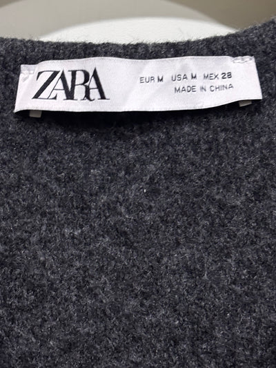 Zara label showing EUR M, USA M and MEX 28 - alternate view