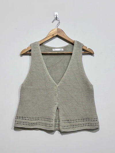 Sage green textured V-neck button-front sleeveless vest with openwork hem