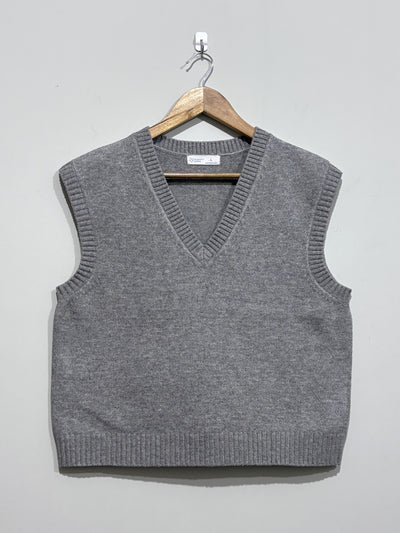 Grey sleeveless V-neck sweater vest with ribbed neckline, armholes and hem