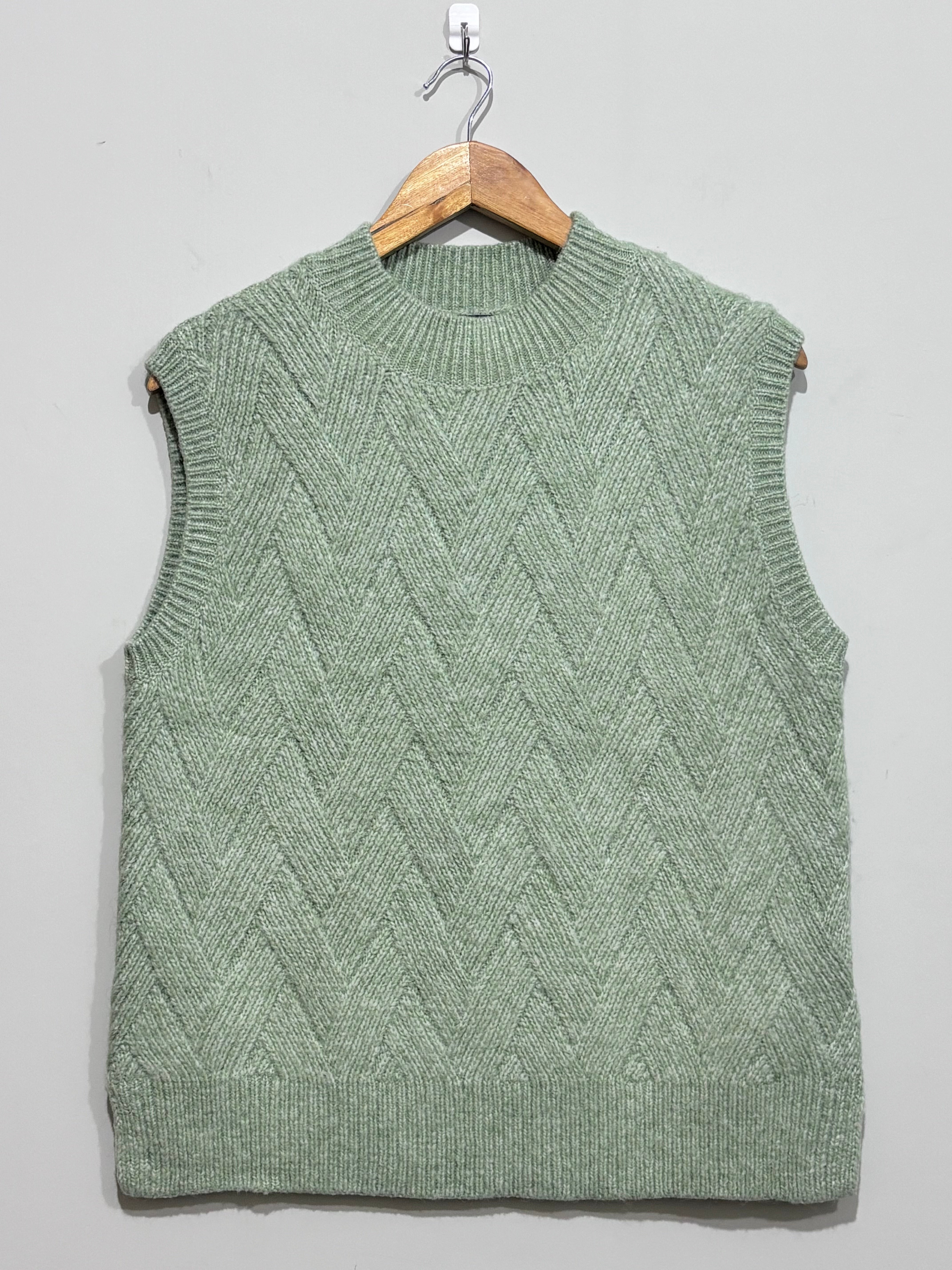 Pale jade chevron-textured crew-neck sweater vest with ribbed edging