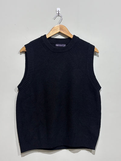 Black sleeveless crew-neck sweater vest with textured stitching and ribbed edging