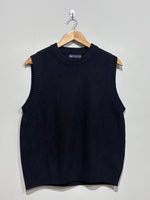 Black sleeveless crew-neck sweater vest with textured stitching and ribbed edging