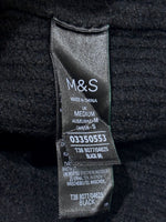 M&S label showing UK MEDIUM and black color
