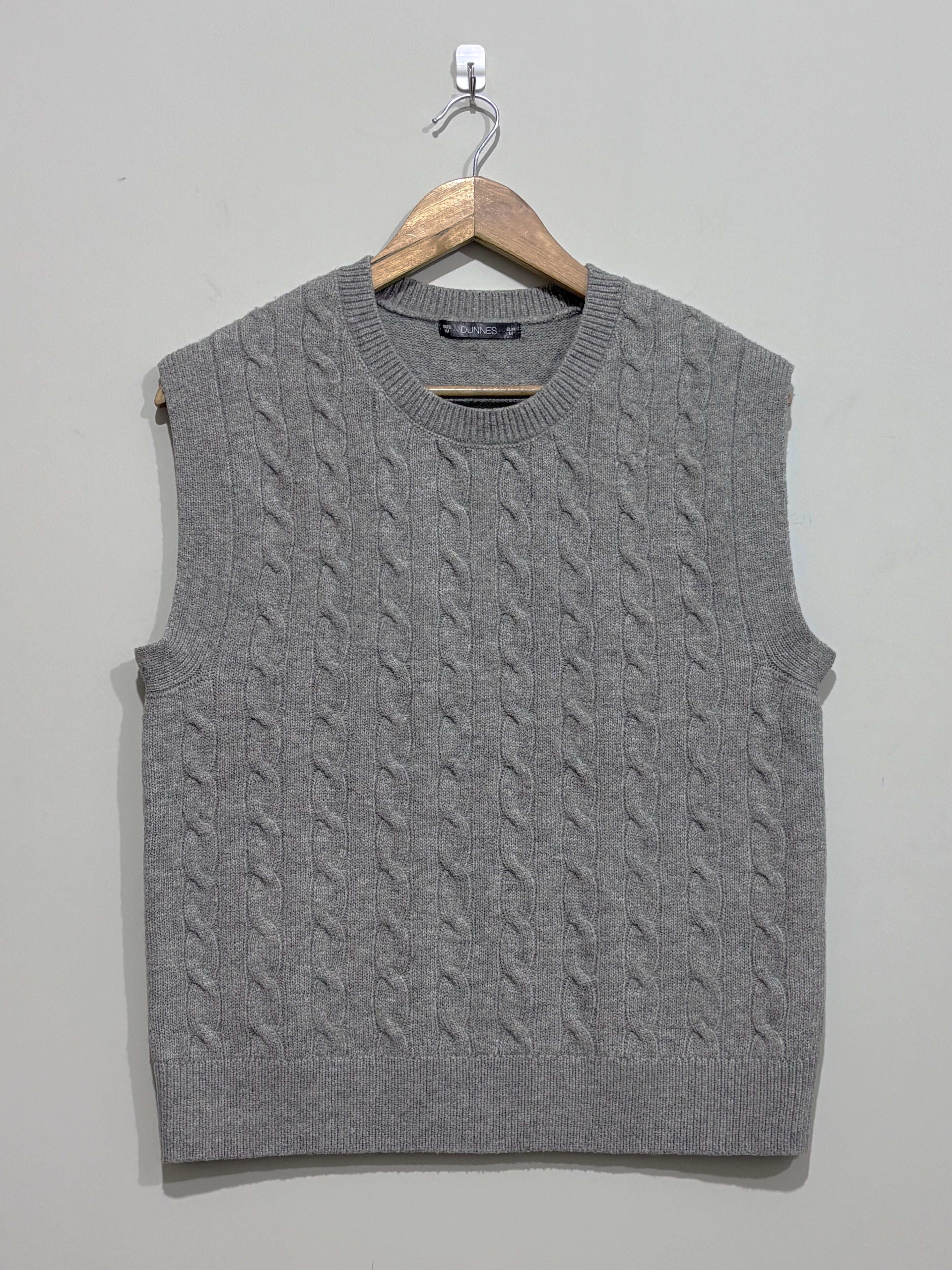 Grey cable-knit crew-neck sleeveless sweater vest with ribbed trim
