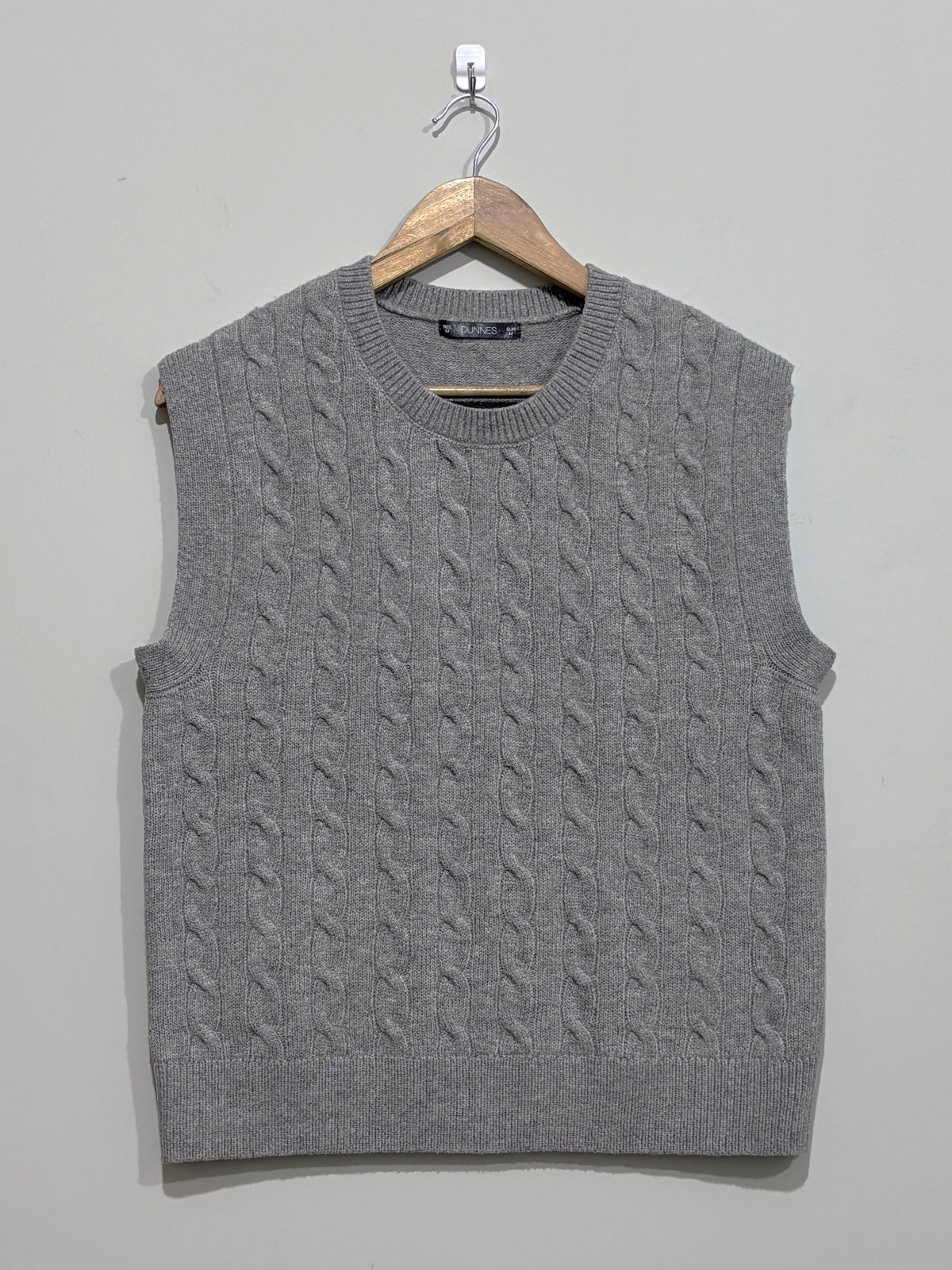 Grey cable-knit crew-neck sleeveless sweater vest with ribbed trim