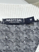 Nasty Gal Collection label showing size M