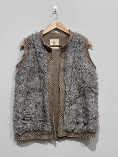 Grey and taupe sleeveless open-front vest with shaggy front panels and chunky-knit edging