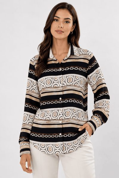 Woman wearing a patterned long-sleeve shirt with a white background